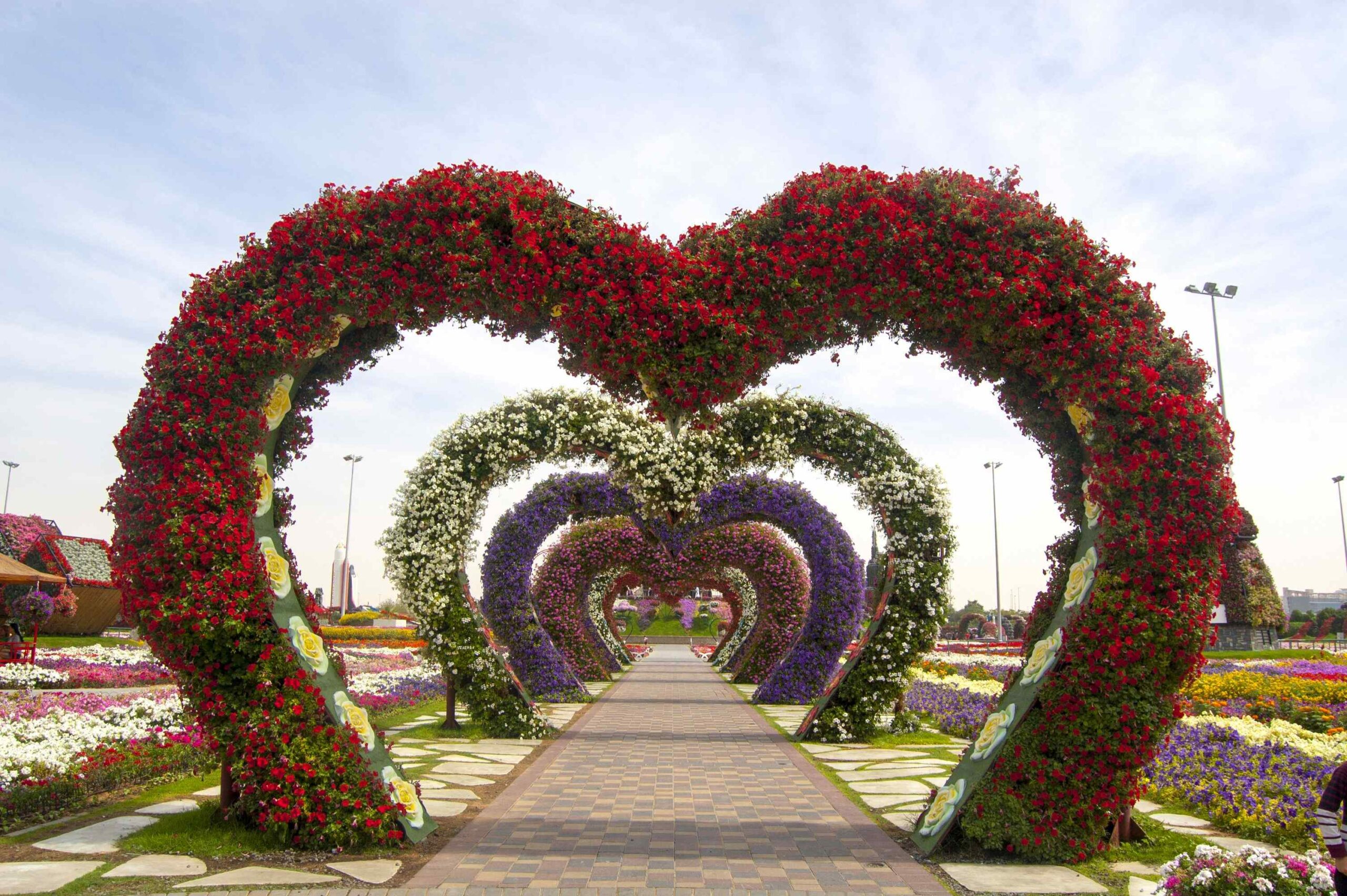 Witness the team's craftsmanship in the vibrant 3D floral characters at the region's beloved flower garden.